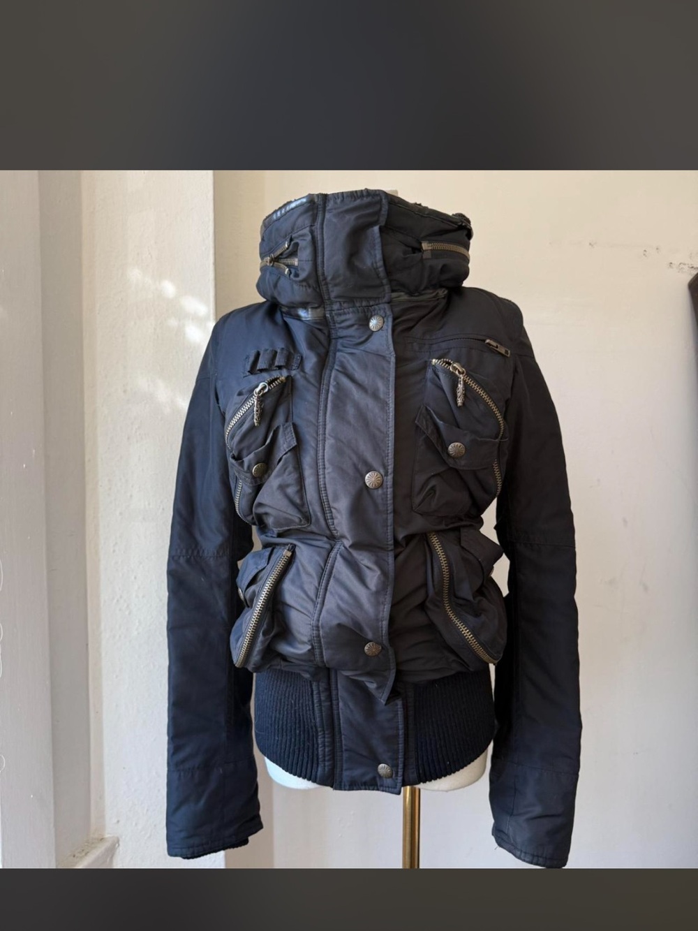 black sly puffer jacket with high neck collar